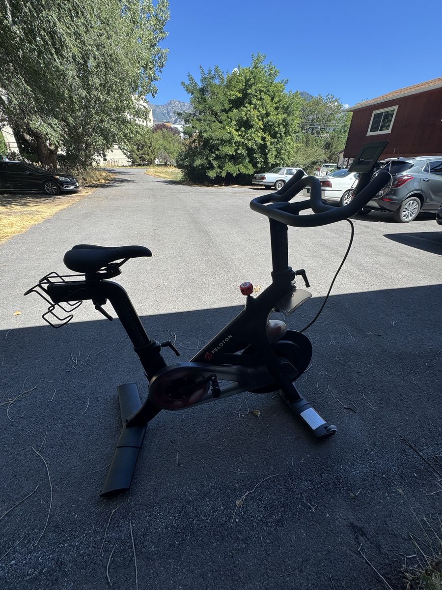 Peloton Exercise Bike with Monitor and Two Pairs of Cycling Shoes