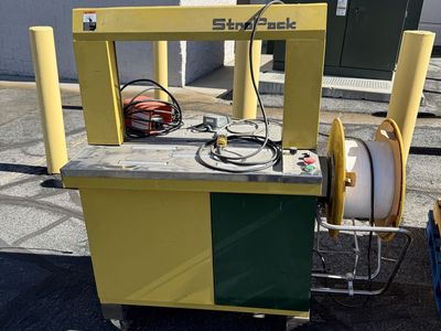 Automatic strapping machine