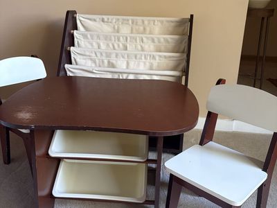 Children’s table, chairs and book sling