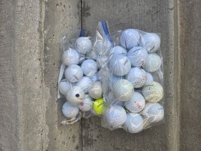 25 Misc. Titleist golf balls in great condition