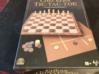 Chess and checkers game board with all pieces.