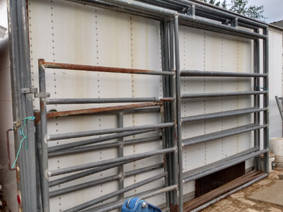 Walk thru gates with attached panel