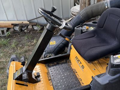 Cub Cadet RZT S Zero-Turn Riding Mower with Steering Wheel and Bagger Attachment