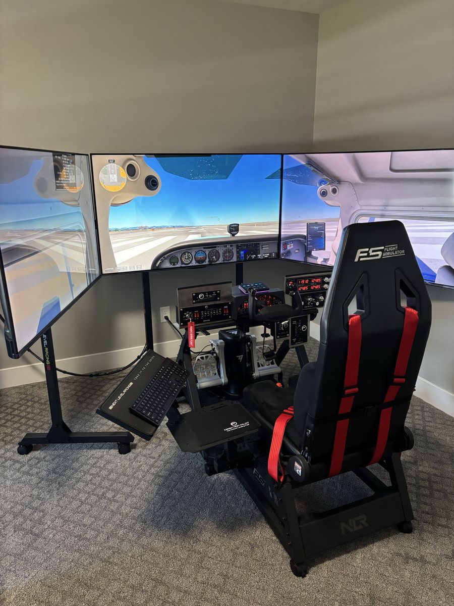 Next Level Racing Flight Simulator Cockpit w/ FS-1 Seat & Triple Monitor Stand