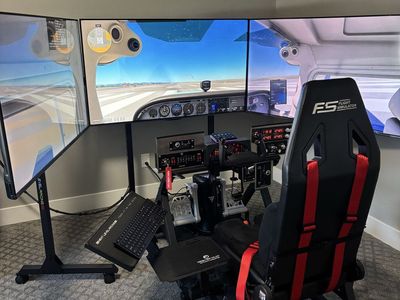 Next Level Racing Flight Simulator Cockpit w/ FS-1 Seat & Triple Monitor Stand