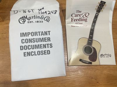 2005 Martin guitar with tuner,capo,hard case in good condition. GREAT SOUND!