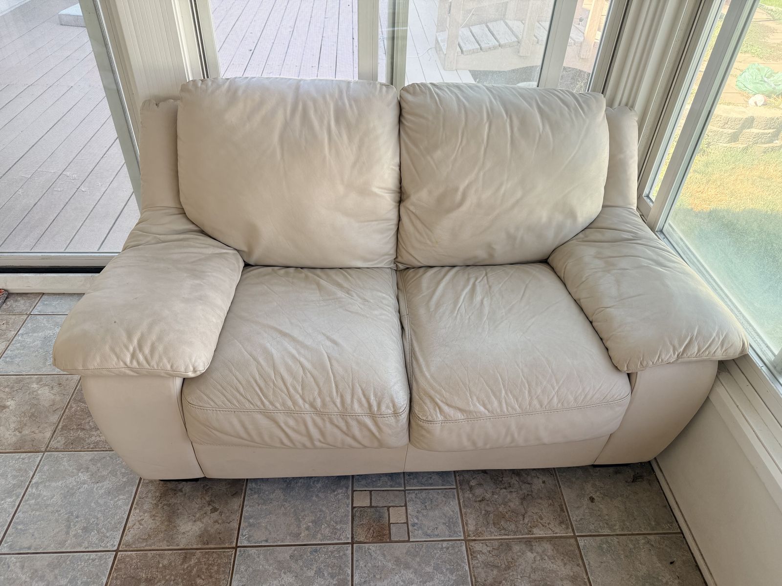 White leather couch and loveseat set