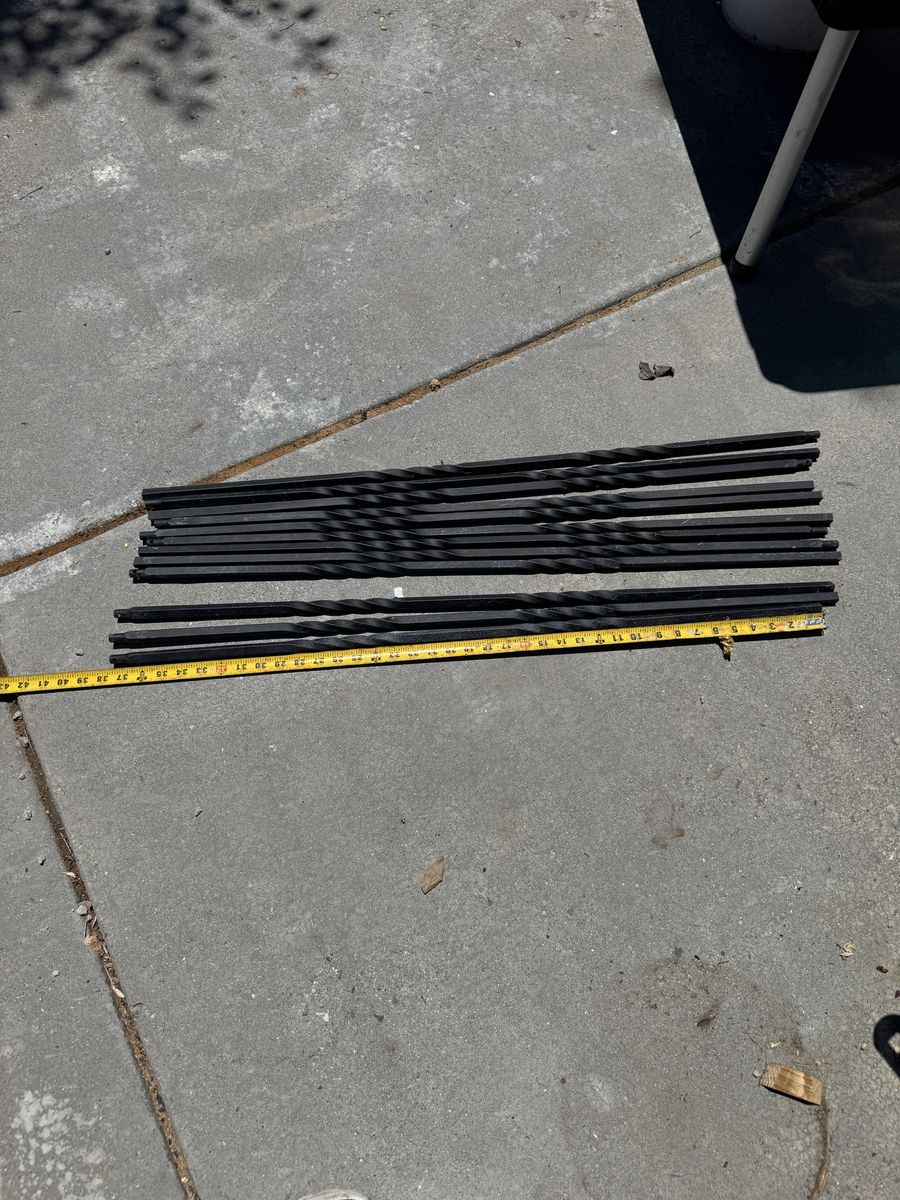 Black wrought iron balusters