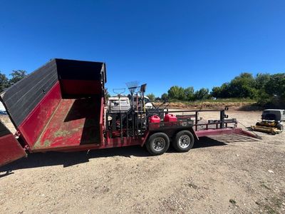 Landscaping trailer with dump bed