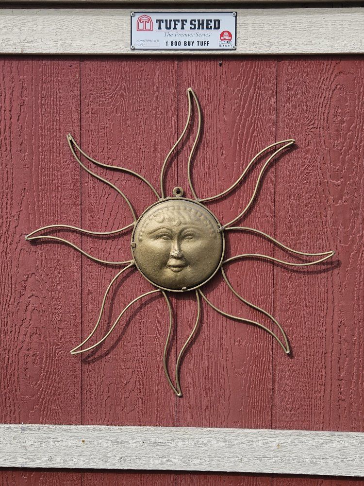 Sun with face, metal gold. Indoor/outdoor