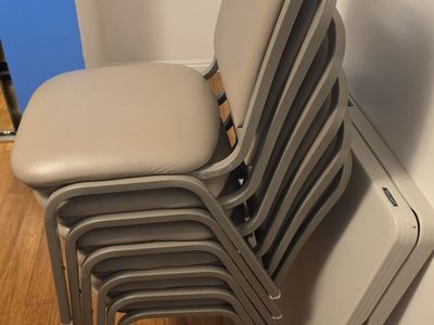 Two Types of Stacked Chairs for Sale.