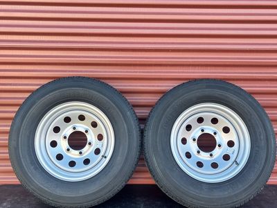 Set of 2 Free Country ST 225/75 R 15 Trailer Tires Mounted on New Silver Wheels Standard 6 Lug Pattern. Bran