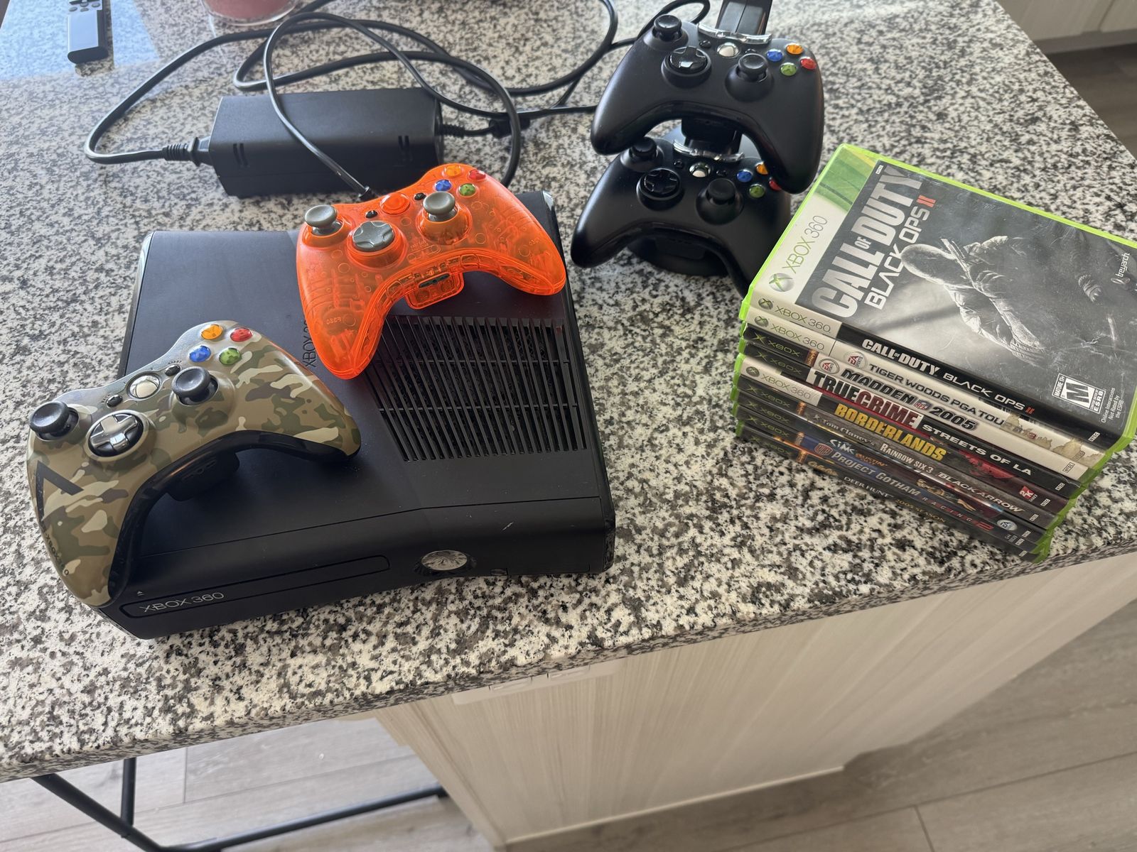Xbox 360 with controllers and games