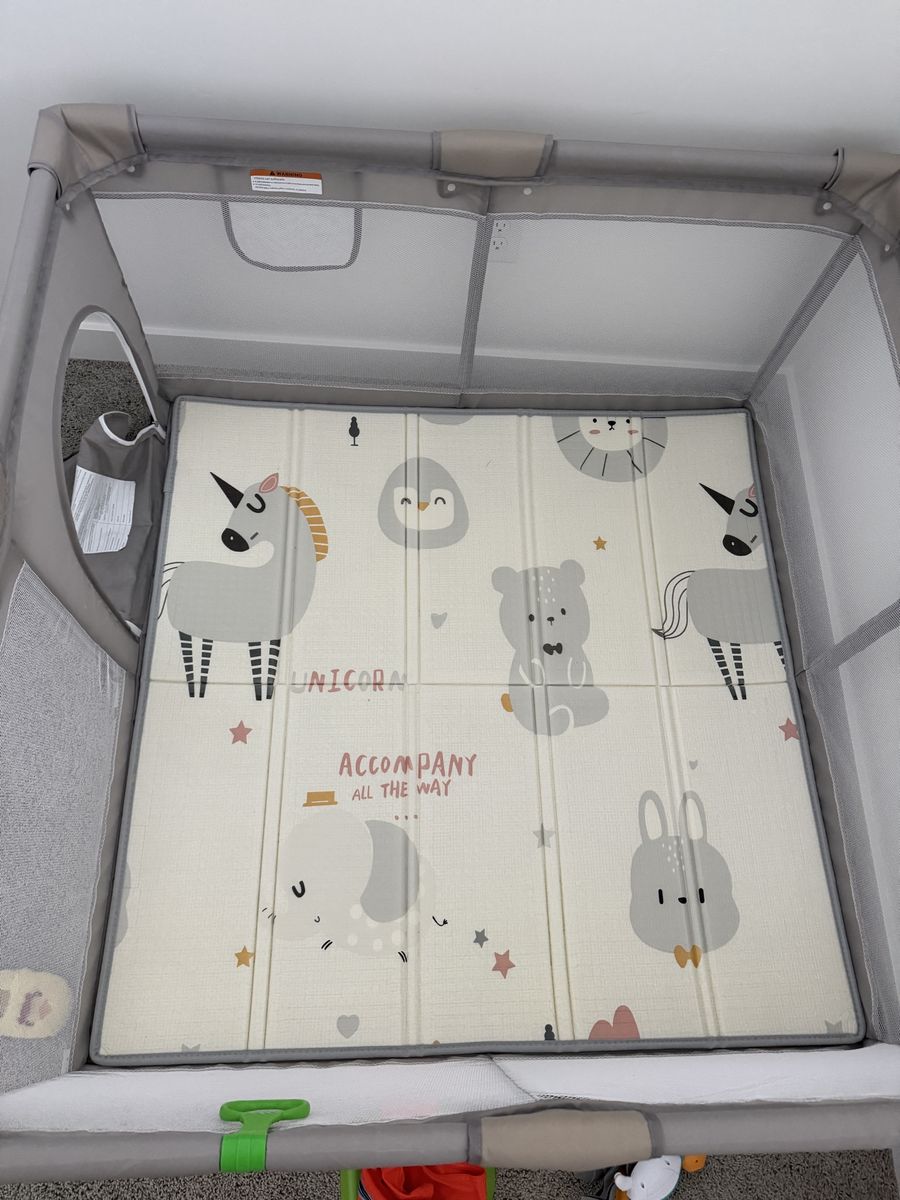 Toddler playpen with mat