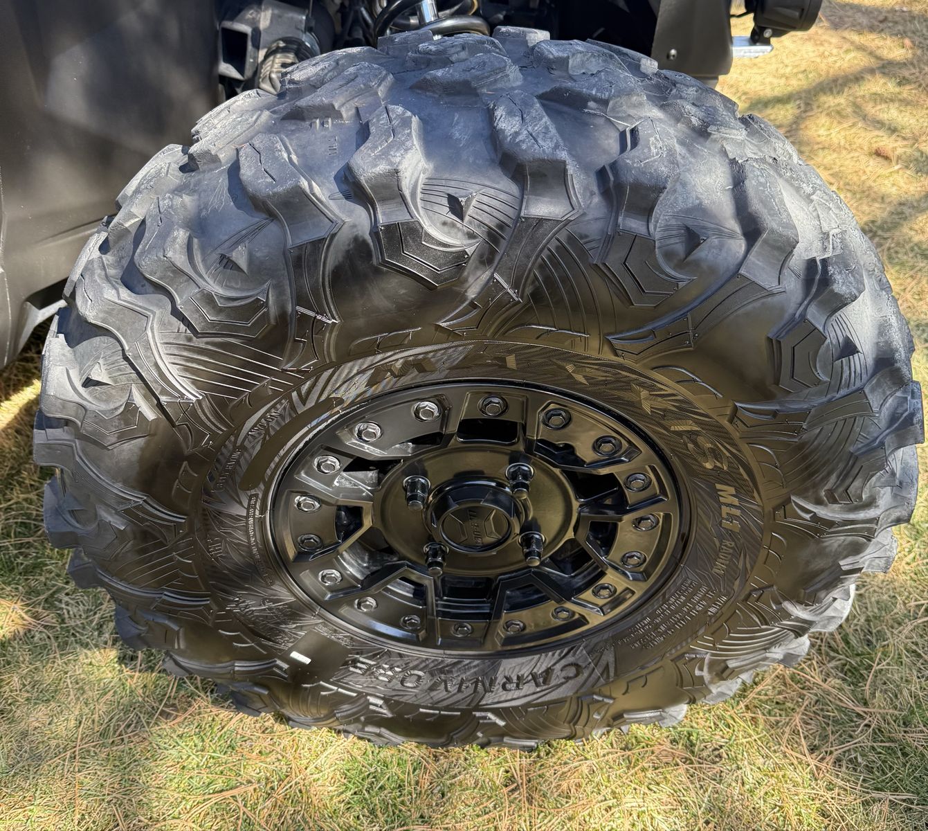 32 Maxxis Carnivore ML1 on 14 Black Can-Am Wheel