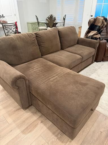 L shaped Sectional/pull out bed