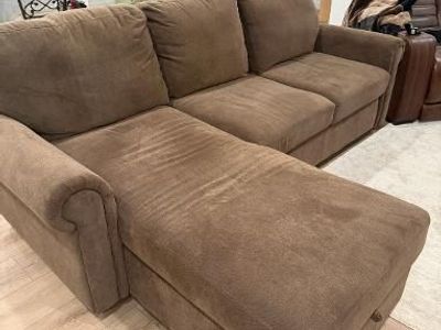 L shaped Sectional/pull out bed