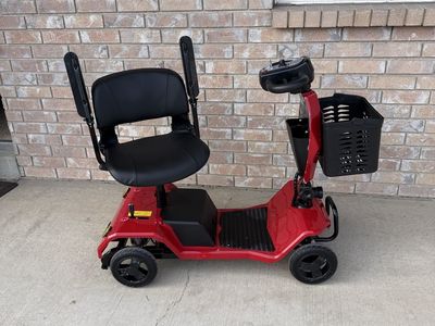New Red Mobility Scooter with Front Basket