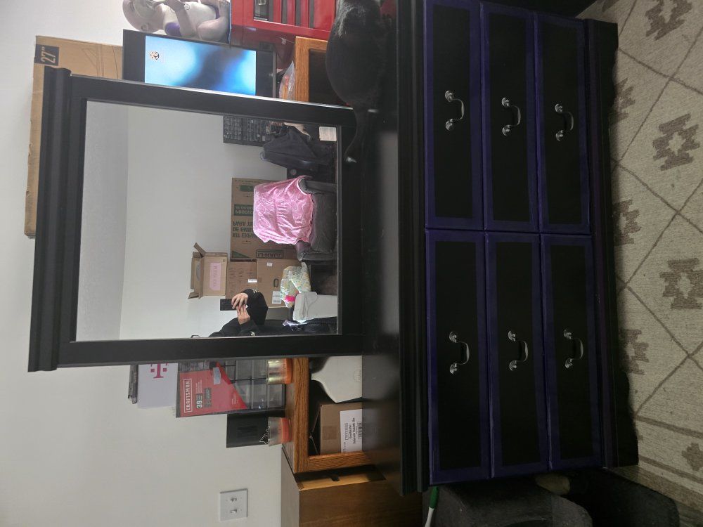 Black dresser and nightstand