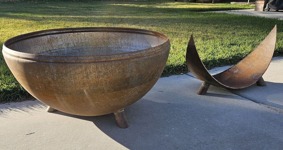 large fire bowl firepit with wood rack