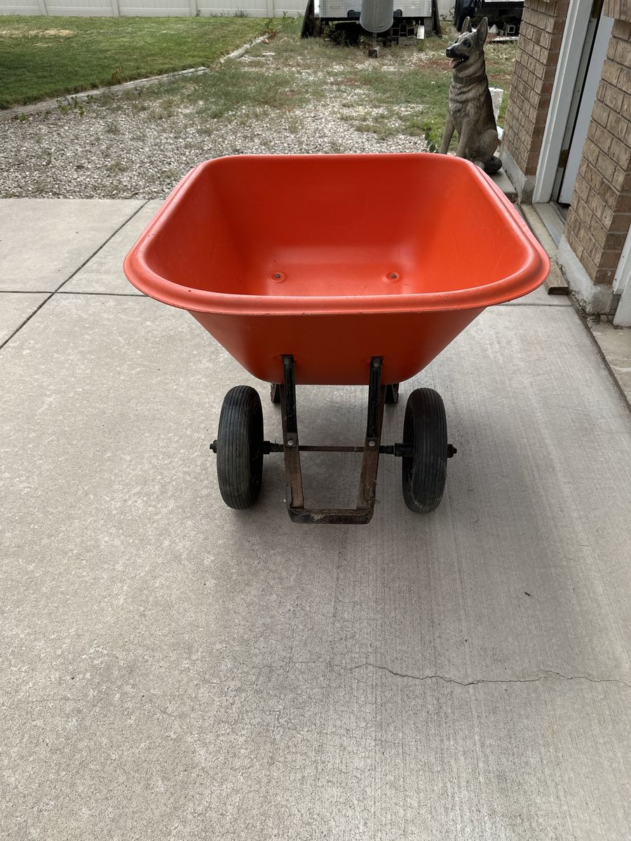 True Temper Big 10 Dual-Wheel Poly Wheelbarrow - Orange