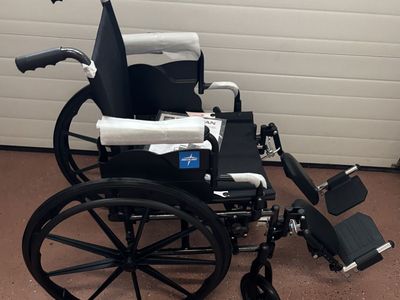 Medline Comfortable Folding Wheelchair with Swing-Back, Desk-Length Arms and Elevating Footrests
