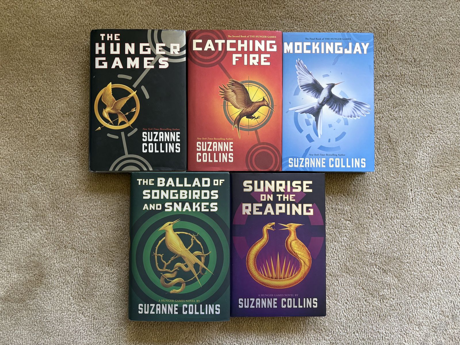The Hunger Games Complete Series, by Suzanne Collins (hardcovers)
