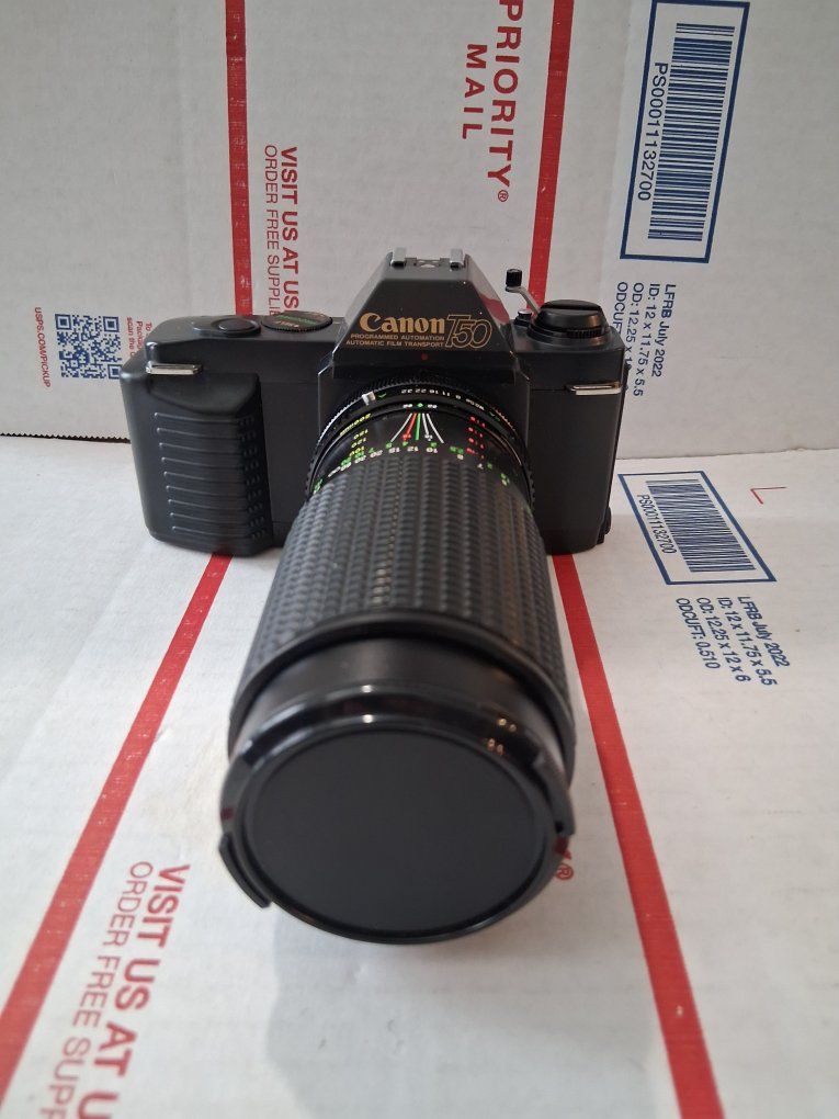 Canon T50 Film Camera with Zoom Lens - Programmed Automatic Film Transport (Tested) Comes with case.