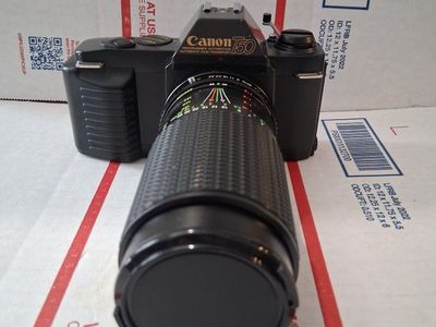 Canon T50 Film Camera with Zoom Lens - Programmed Automatic Film Transport (Tested) Comes with case.