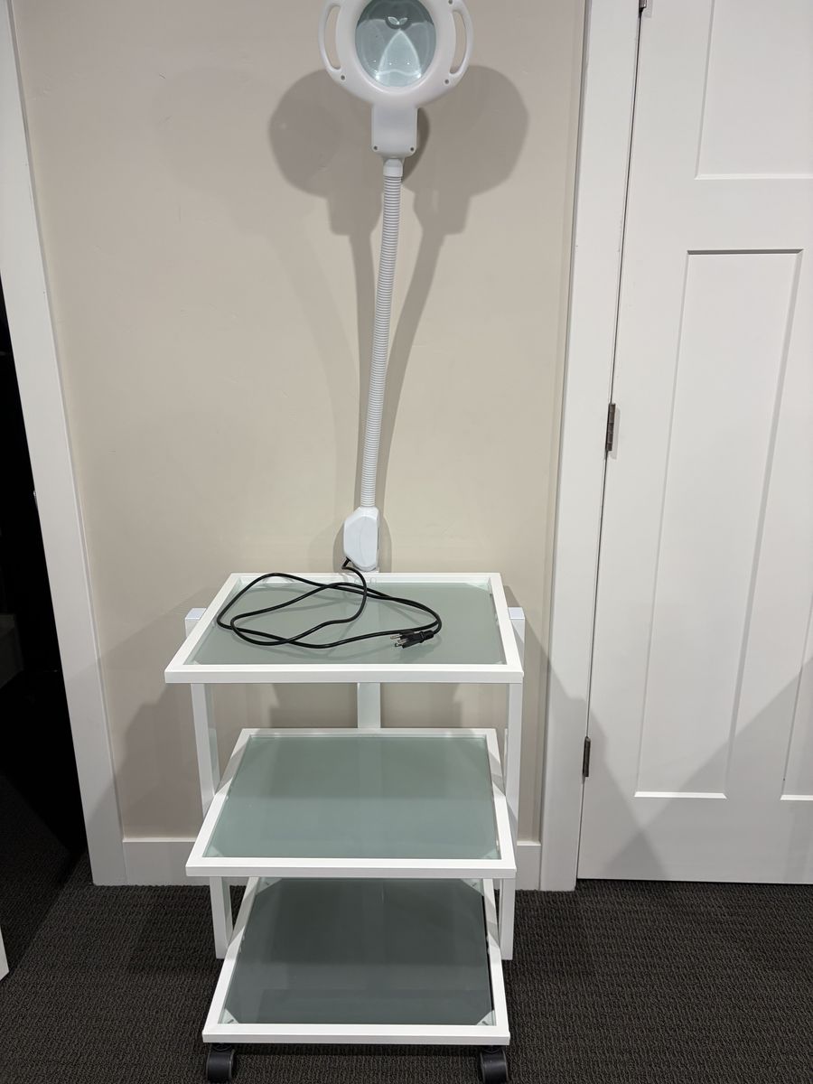 Glass medical cart w/light and magnifying glass - 3 shelves