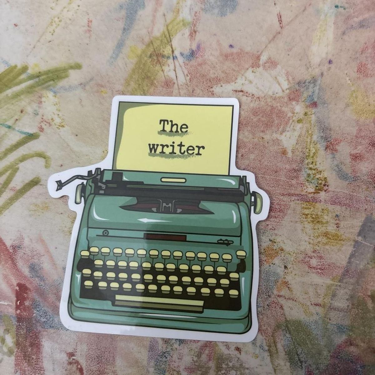 The Writer Vintage Typewriter Vinyl Sticker - Green & Yellow Die-Cut Decal for Laptops, Journals