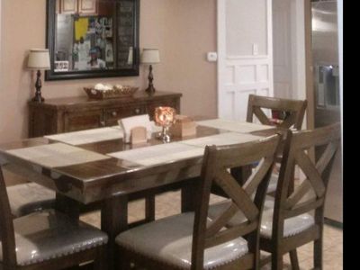 wood dining table and server