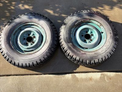 Stock wheels with tires taken off a 1947 Chevy pickup.