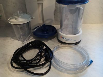 PureWick urine collection system with battery