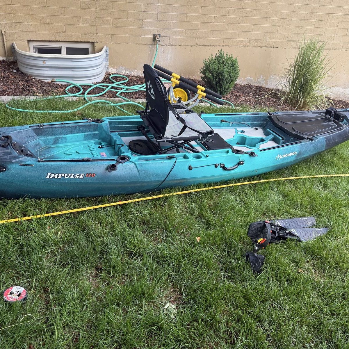 12 foot kayak with pedal drive and cart. With transducer.