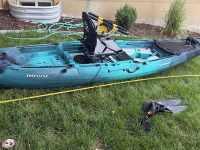 12 foot kayak with pedal drive and cart. With transducer.