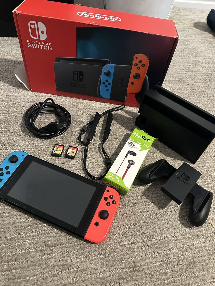 Nintendo Switch Console with Neon Blue and Red Joy-Cons and Accessories