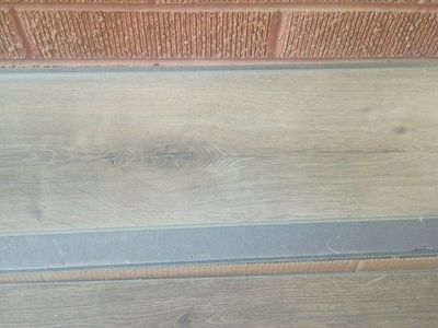 Mohawk flooring, cortec, 589 ft², laminate, waterproof, warrantied by manufacturer lifetime.