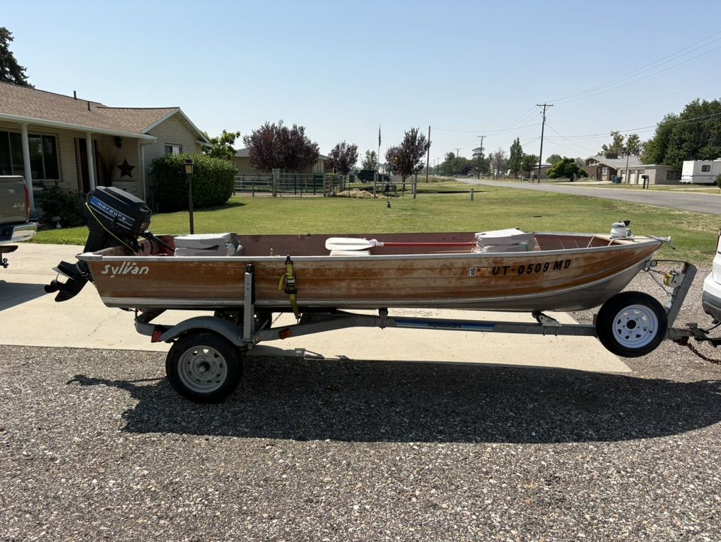 14 ft Aluminum Boat And 9.9 Outboard Motor