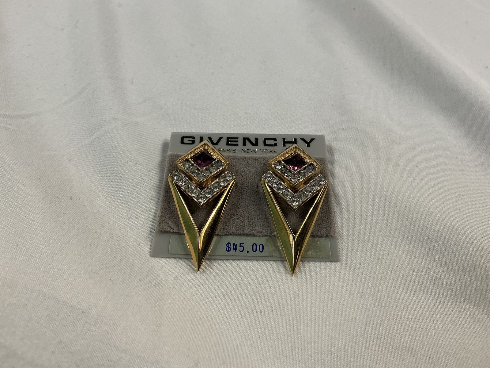 Givenchy clip on earrings.