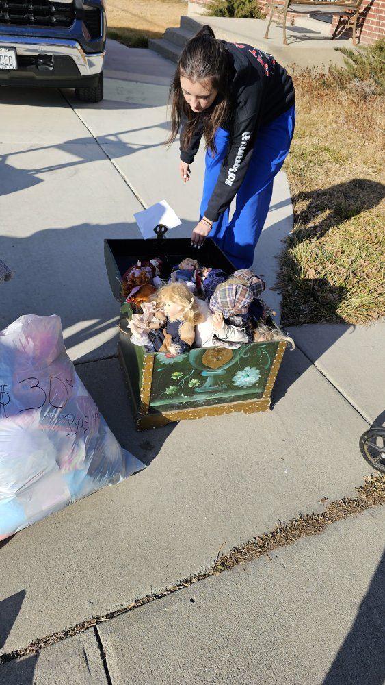 Porcelain dolls and trunk