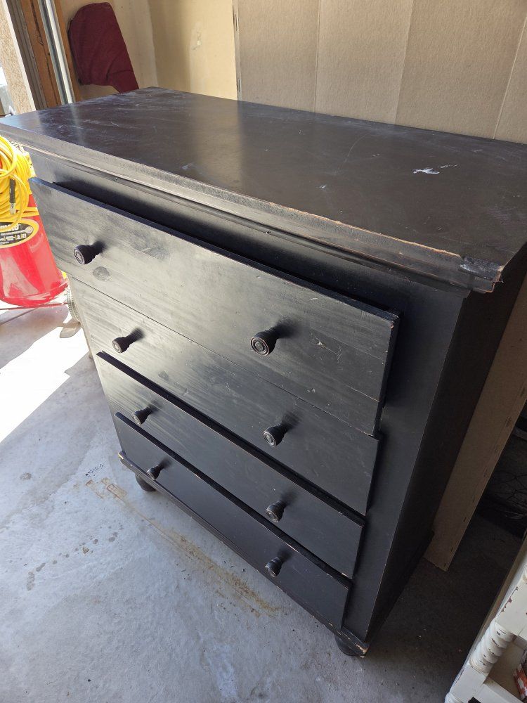 Black Wooden 4-Drawer Dresser/Chest - Used, distressed finish
