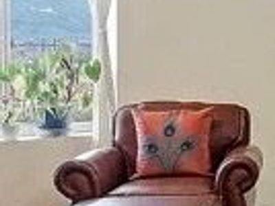 Leather Sofa and Loveseat Set also lounge chair- Rich Brown, end table, coffee table and behind sofa table that expands