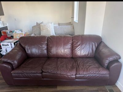 Brown/red leather couch