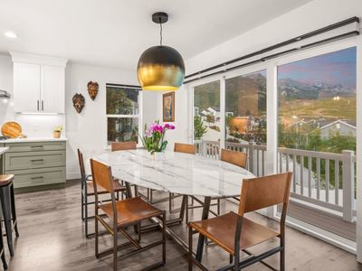 Modern Oval White Marble Dining Table 96” with Pewter Metal Base & 7 Pottery Barn chairs