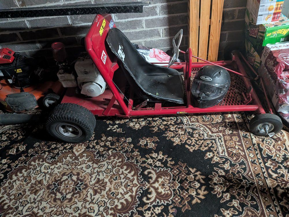Red Racing Go-Kart with Engine and Black Seat - Ready for the Track!