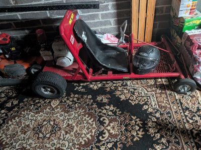 Red Racing Go-Kart with Engine and Black Seat - Ready for the Track!
