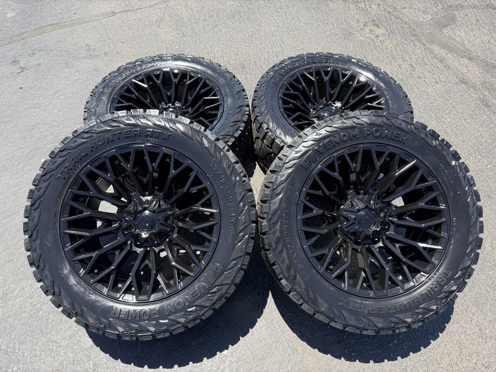 New 33x12.50r20 Venom ATX Black Fuel Strike 6x5.5 Chevy Silverado 1500 GMC 6x135 Ford F150 F 150 Ram 1500 6 lug wheels and tires