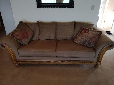 Upholstered Couch and love couch with Wood Trim and Carved Legs