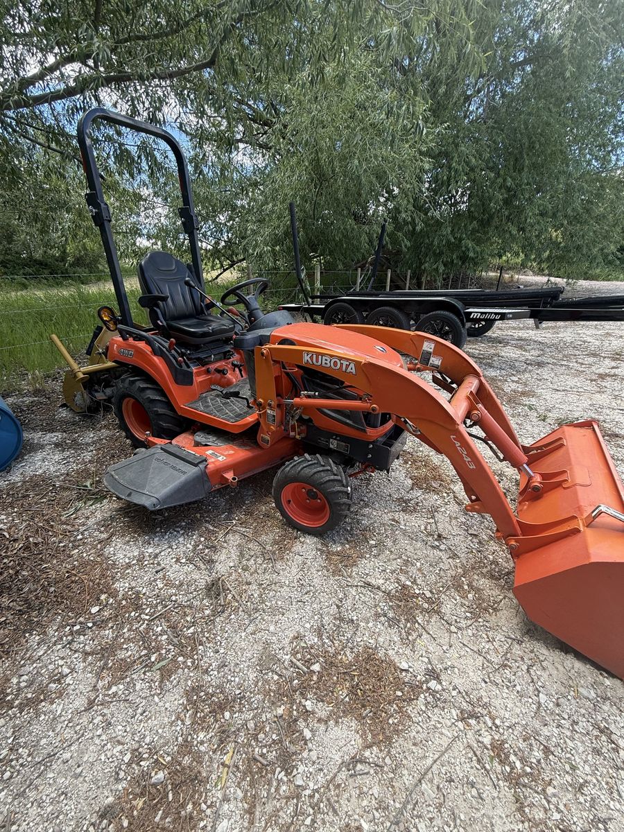 Kubota compact tractor / mower/ tiller